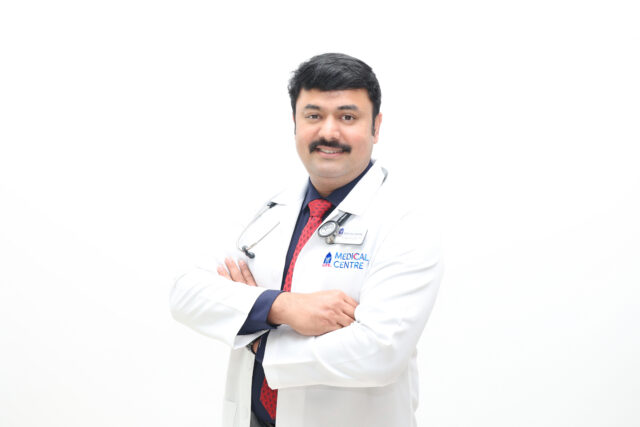 Dr. Sandeep Thomas, General Physician, Life Medical Centre smoking 